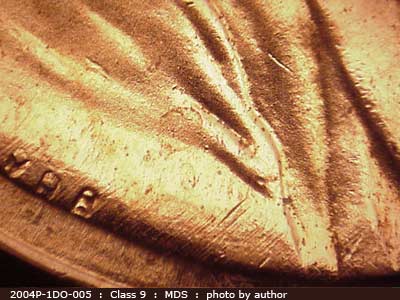Die-stage B marker on 2004P•1DO•005 (2004 Doubled Die Obverse).