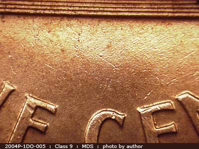 Die-stage B marker on 2004P•1DO•005 (2004 Doubled Die Obverse).