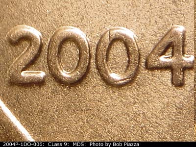 Die-stage B marker on 2004P•1DO•006 (2004 Doubled Die Obverse).
