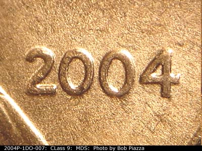 Die-stage B marker on 2004P•1DO•007 (2004 Doubled Die Obverse).
