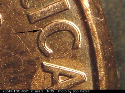 Die-stage B marker on 2004P•1DO•007 (2004 Doubled Die Obverse).