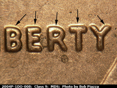 Die-stage B marker on 2004P•1DO•008 (2004 Doubled Die Obverse).