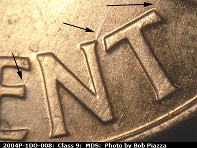 Die-stage B marker on 2004P•1DO•008 (2004 Doubled Die Obverse).
