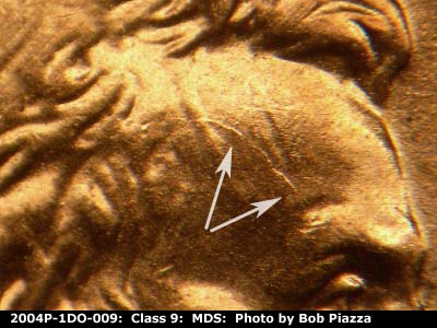 Die-stage B marker on 2004P•1DO•009 (2004 Doubled Die Obverse).