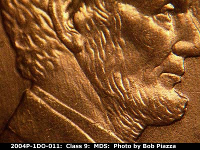 Die-stage B marker on 2004P•1DO•011 (2004 Doubled Die Obverse).
