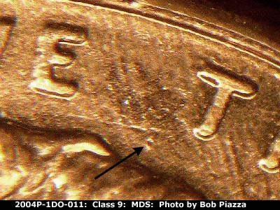 Die-stage B marker on 2004P•1DO•011 (2004 Doubled Die Obverse).
