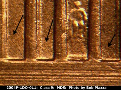 Die-stage B marker on 2004P•1DO•011 (2004 Doubled Die Obverse).