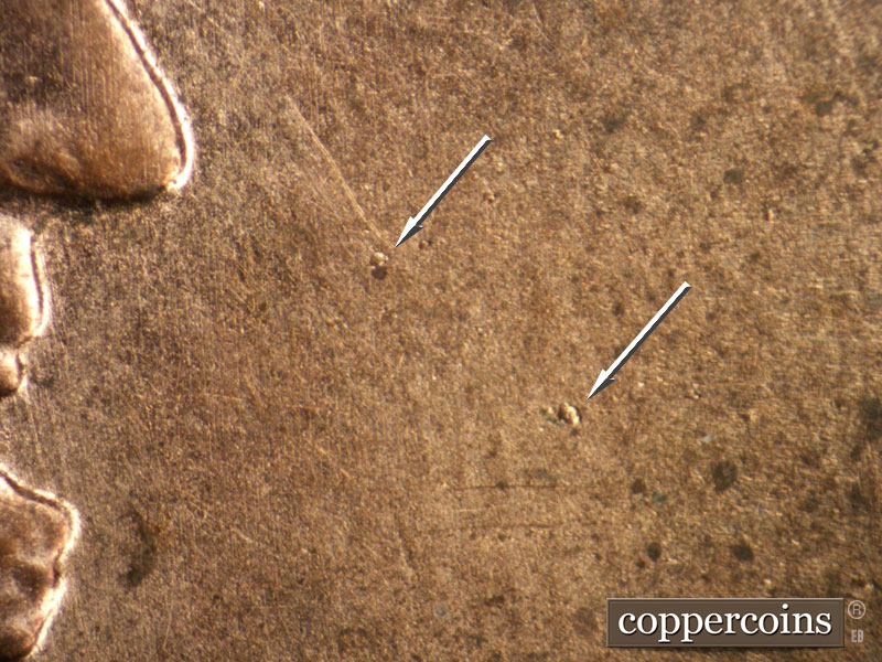 Die-stage B marker on 2004P•1DO•012 (2004 Doubled Die Obverse).