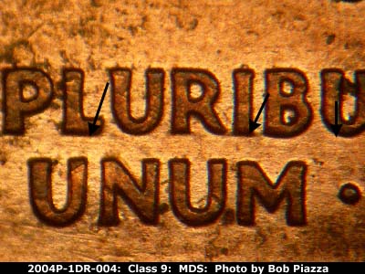 Die-stage B marker on 2004P•1DR•004 (2004 Doubled Die Reverse).