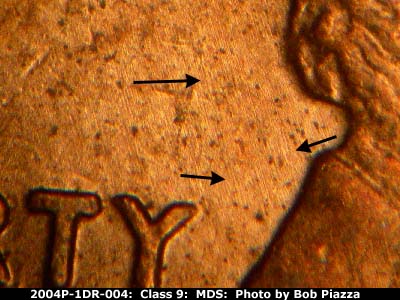 Die-stage B marker on 2004P•1DR•004 (2004 Doubled Die Reverse).