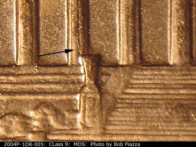 Die-stage B marker on 2004P•1DR•005 (2004 Doubled Die Reverse).