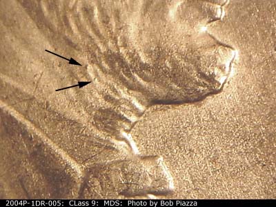 Die-stage B marker on 2004P•1DR•005 (2004 Doubled Die Reverse).