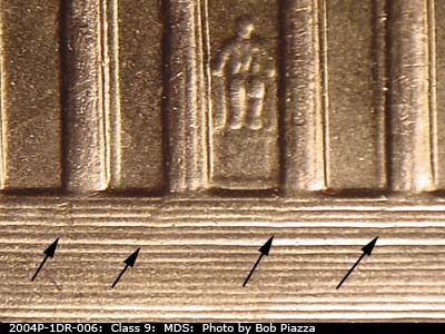 Die-stage B marker on 2004P•1DR•006 (2004 Doubled Die Reverse).