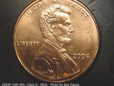 Die-stage B marker on 2004P•1DR•006 (2004 Doubled Die Reverse).