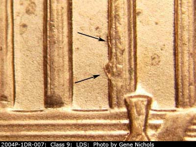 Die-stage B marker on 2004P•1DR•007 (2004 Doubled Die Reverse).