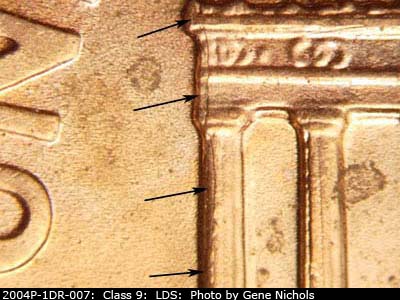Die-stage B marker on 2004P•1DR•007 (2004 Doubled Die Reverse).