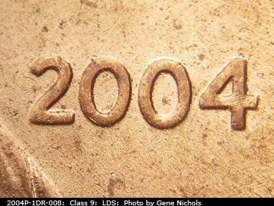 Die-stage C marker on 2004P•1DR•008 (2004 Doubled Die Reverse).