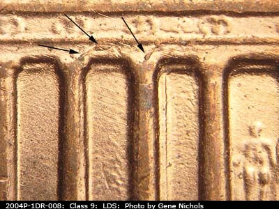 Die-stage C marker on 2004P•1DR•008 (2004 Doubled Die Reverse).