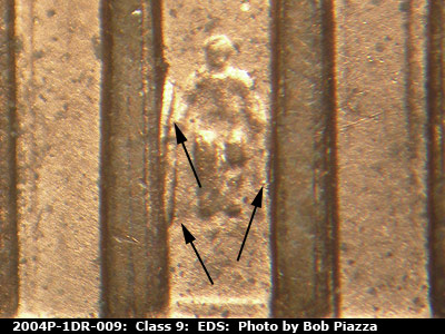 Die-stage A marker on 2004P•1DR•009 (2004 Doubled Die Reverse).