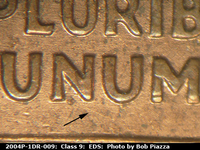 Die-stage A marker on 2004P•1DR•009 (2004 Doubled Die Reverse).