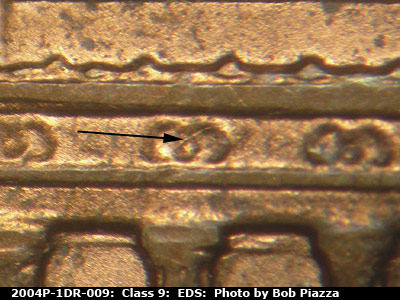Die-stage A marker on 2004P•1DR•009 (2004 Doubled Die Reverse).