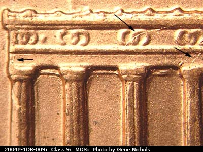 Die-stage B marker on 2004P•1DR•009 (2004 Doubled Die Reverse).