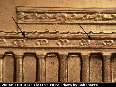 Die-stage B marker on 2004P•1DR•012 (2004 Doubled Die Reverse).