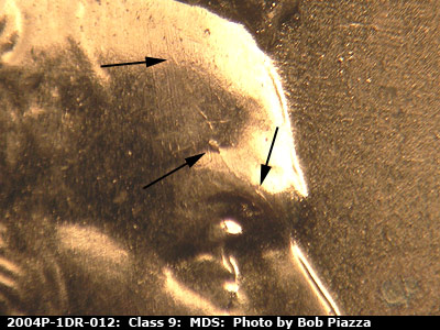 Die-stage B marker on 2004P•1DR•012 (2004 Doubled Die Reverse).