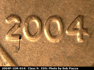 Die-stage A marker on 2004P•1DR•014 (2004 Doubled Die Reverse).