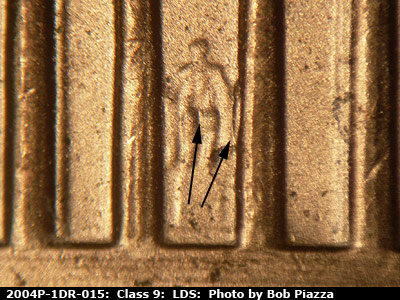 Die-stage C marker on 2004P•1DR•015 (2004 Doubled Die Reverse).