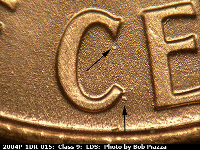 Die-stage C marker on 2004P•1DR•015 (2004 Doubled Die Reverse).