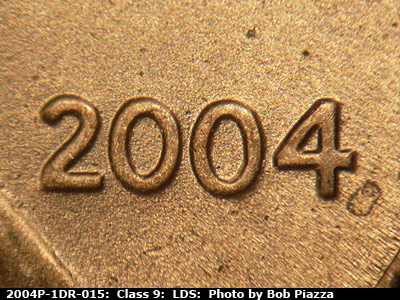 Die-stage C marker on 2004P•1DR•015 (2004 Doubled Die Reverse).