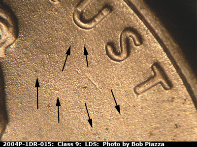 Die-stage C marker on 2004P•1DR•015 (2004 Doubled Die Reverse).