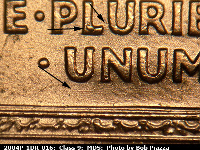 Die-stage B marker on 2004P•1DR•016 (2004 Doubled Die Reverse).
