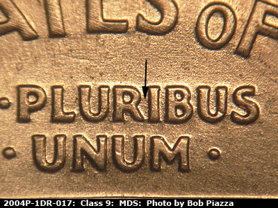 Die-stage B marker on 2004P•1DR•017 (2004 Doubled Die Reverse).