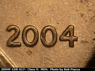 Die-stage B marker on 2004P•1DR•017 (2004 Doubled Die Reverse).