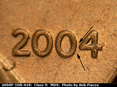Die-stage B marker on 2004P•1DR•018 (2004 Doubled Die Reverse).