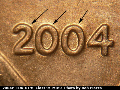 Die-stage B marker on 2004P•1DR•019 (2004 Doubled Die Reverse).