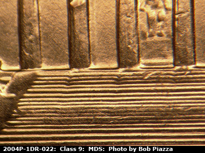 Die-stage B marker on 2004P•1DR•022 (2004 Doubled Die Reverse).