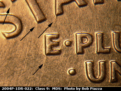 Die-stage B marker on 2004P•1DR•022 (2004 Doubled Die Reverse).