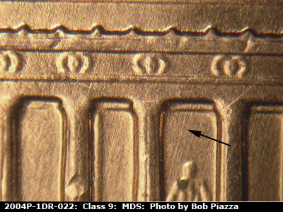 Die-stage B marker on 2004P•1DR•022 (2004 Doubled Die Reverse).