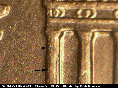 Die-stage B marker on 2004P•1DR•023 (2004 Doubled Die Reverse).