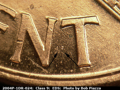 Die-stage A marker on 2004P•1DR•024 (2004 Doubled Die Reverse).