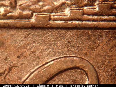 Die-stage B marker on 2004P•1DR•025 (2004 Doubled Die Reverse).