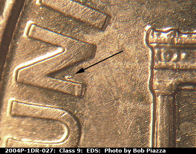 Die-stage A marker on 2004P•1DR•027 (2004 Doubled Die Reverse).