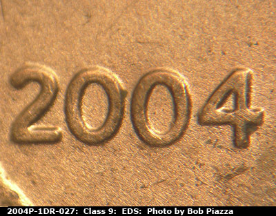 Die-stage A marker on 2004P•1DR•027 (2004 Doubled Die Reverse).