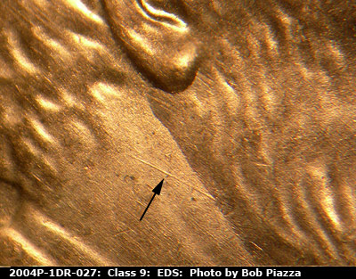 Die-stage A marker on 2004P•1DR•027 (2004 Doubled Die Reverse).