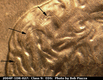 Die-stage A marker on 2004P•1DR•027 (2004 Doubled Die Reverse).