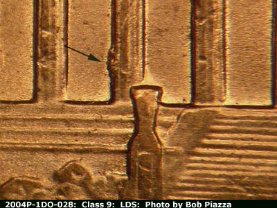 Die-stage C marker on 2004P•1DR•028 (2004 Doubled Die Reverse).