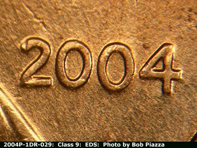 Die-stage A marker on 2004P•1DR•029 (2004 Doubled Die Reverse).